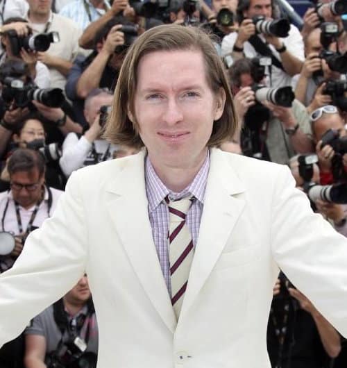 Photo of Wes Anderson hairstyle.