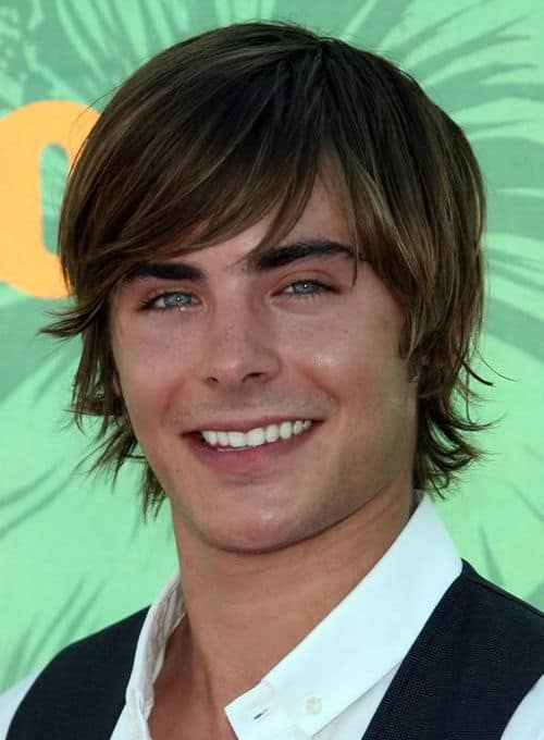 Picture of Zac Efron floppy shag hairstyle.
